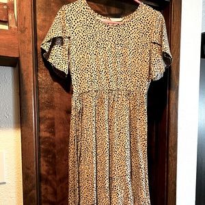 Tan and black spotted dress. Size small. Modest dress. 41in Length.